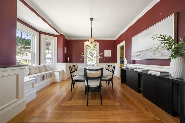 1 Murdock Ter, Boston, MA 02135 - dining room with a chandelier, wainscoting, and ornamental molding