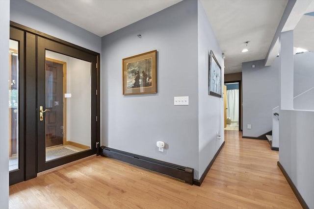 23 Mulholland Dr, Ipswich, MA 01938 - hall with light wood-style floors and stairway