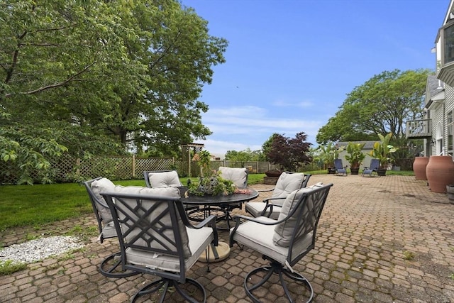 23 Mulholland Dr, Ipswich, MA 01938 - fenced backyard with a patio and outdoor dining area