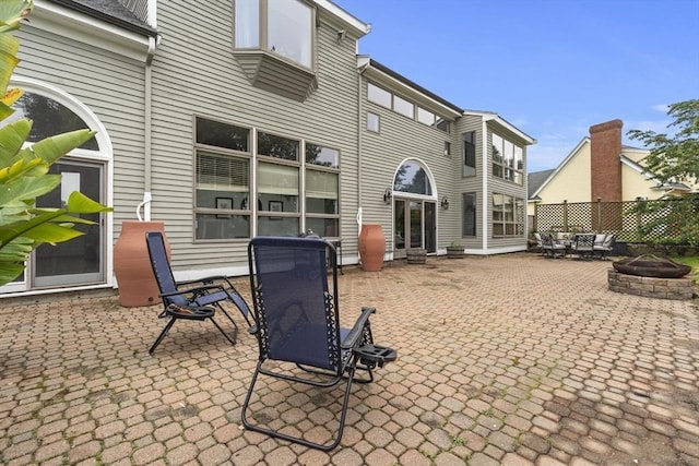 23 Mulholland Dr, Ipswich, MA 01938 - view of patio / terrace featuring a fire pit