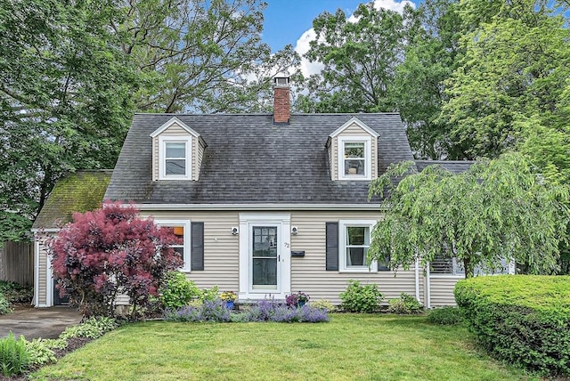 72 Marlboro St, Dedham, MA 02026 - cape cod-style house with a front yard, a chimney, and roof with shingles