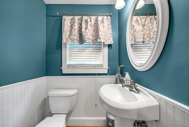 72 Marlboro St, Dedham, MA 02026 - bathroom with wainscoting and toilet