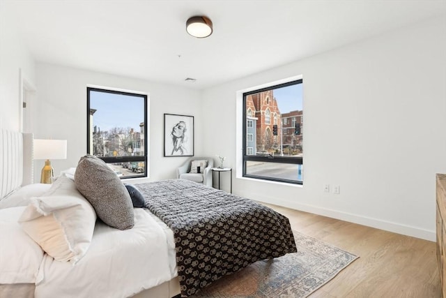 236-256 Dorchester St Unit 201, Boston, MA 02127 - bedroom featuring light wood finished floors and baseboards