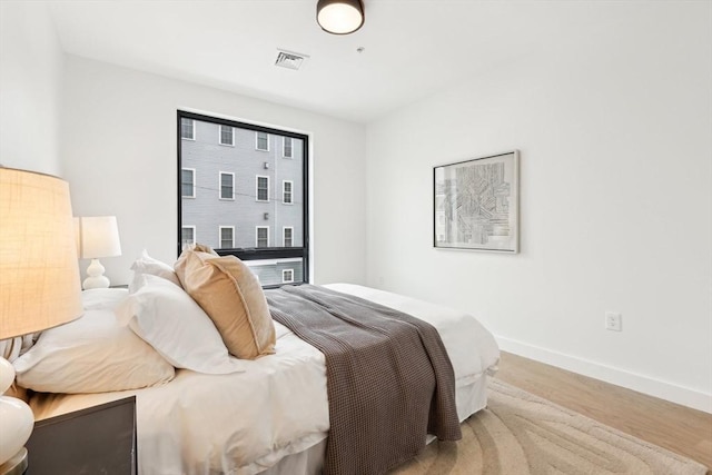 236-256 Dorchester St Unit 201, Boston, MA 02127 - bedroom featuring wood finished floors and baseboards