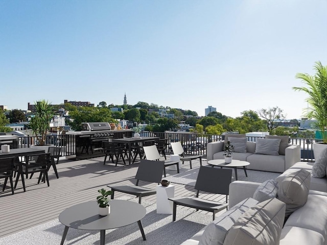 236-256 Dorchester St Unit 201, Boston, MA 02127 - view of patio featuring an outdoor living space, outdoor dining area, and a deck