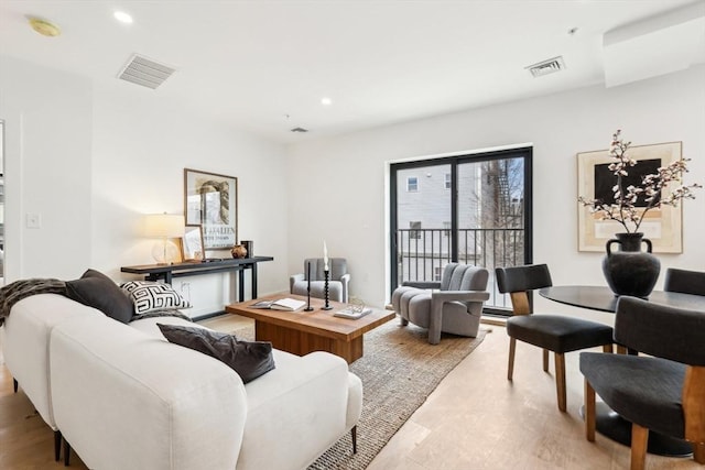 236-256 Dorchester St Unit 201, Boston, MA 02127 - living area with light wood-type flooring and recessed lighting