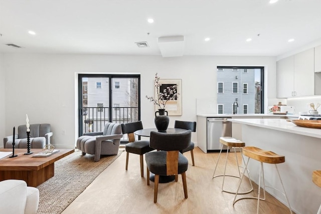 236-256 Dorchester St Unit 201, Boston, MA 02127 - living room featuring plenty of natural light, recessed lighting, and light wood-type flooring