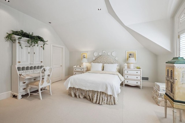 135 Marsh St, Belmont, MA 02478 - bedroom with baseboards, visible vents, vaulted ceiling, and light colored carpet