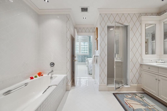 135 Marsh St, Belmont, MA 02478 - bathroom featuring a bath, visible vents, tile patterned floors, vanity, and ornamental molding