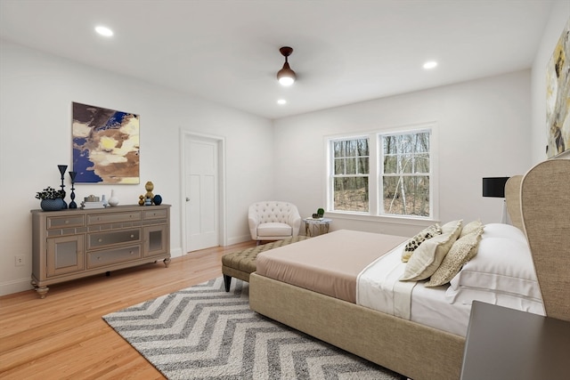 bedroom with hardwood / wood-style flooring