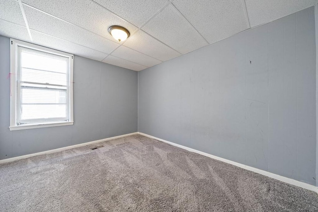 48 Rocliffe St, Fall River, MA 02723 - empty room featuring a drop ceiling, carpet floors, and baseboards