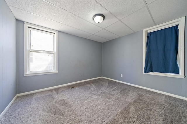 48 Rocliffe St, Fall River, MA 02723 - empty room featuring carpet, baseboards, and a paneled ceiling