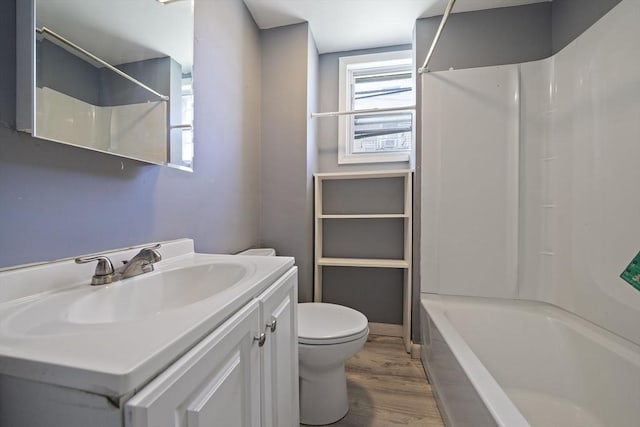 48 Rocliffe St, Fall River, MA 02723 - bathroom with toilet, vanity, wood finished floors, and shower / bath combination