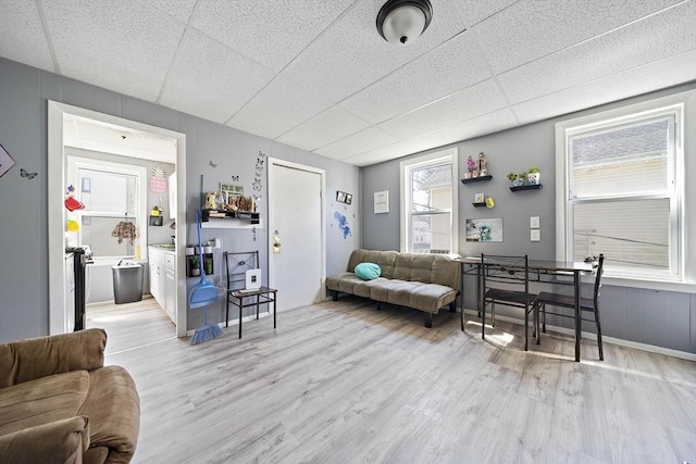 48 Rocliffe St, Fall River, MA 02723 - living area with wood finished floors and a drop ceiling
