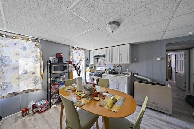 48 Rocliffe St, Fall River, MA 02723 - dining area with a paneled ceiling, light wood-style floors, and heating unit