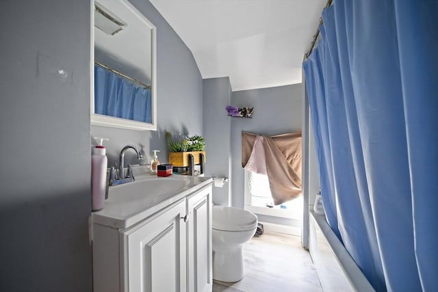 48 Rocliffe St, Fall River, MA 02723 - bathroom with toilet, vanity, shower / tub combo, and wood finished floors