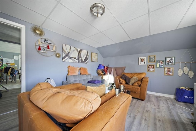 48 Rocliffe St, Fall River, MA 02723 - living area with wood finished floors, baseboards, vaulted ceiling, and a paneled ceiling