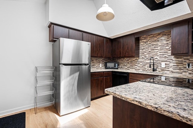 98 Eastern Ave Unit 403, Worcester, MA 01605 - kitchen with black appliances, a sink, backsplash, light wood-style flooring, and high vaulted ceiling