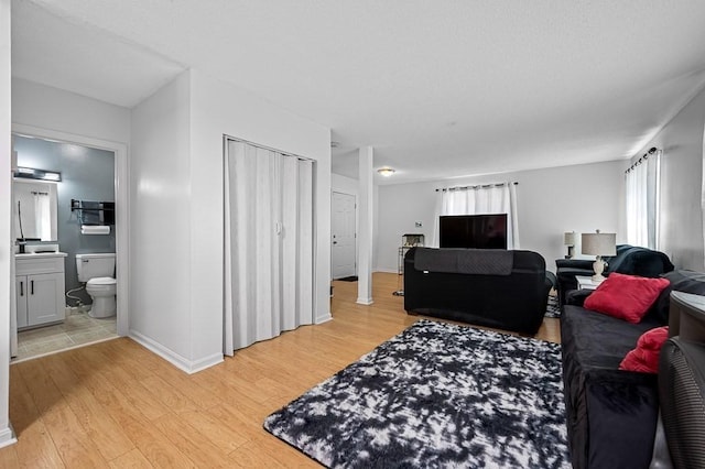 98 Eastern Ave Unit 403, Worcester, MA 01605 - living area with light wood finished floors and baseboards