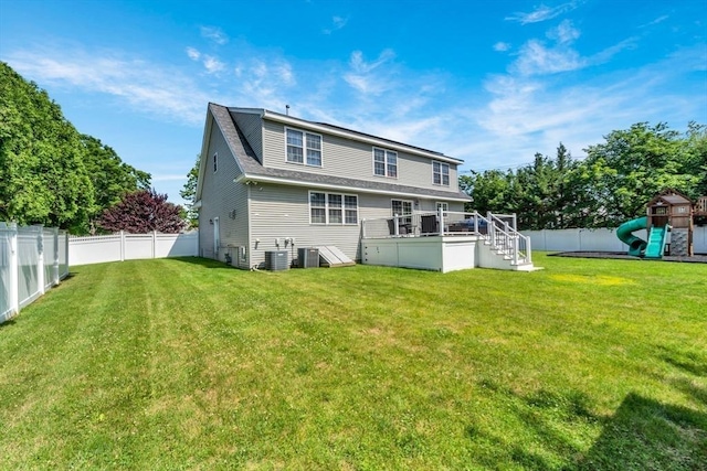 47 Fenwick Cir, Methuen, MA 01844 - rear view of property featuring a fenced backyard, a wooden deck, and a playground