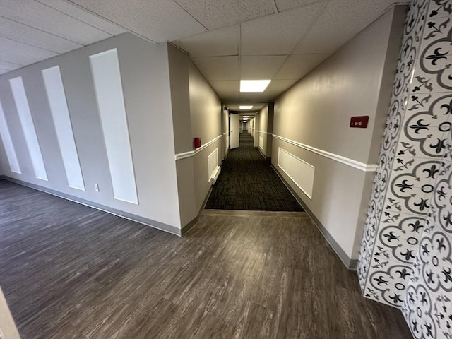 147 Turner Rd Unit 102, Holliston, MA 01746 - hallway with dark wood finished floors and a paneled ceiling