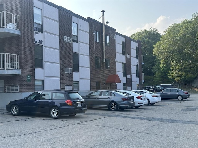 147 Turner Rd Unit 102, Holliston, MA 01746 - view of apartment building / complex featuring uncovered parking