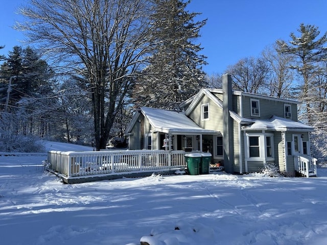 view of front of home with a chimney