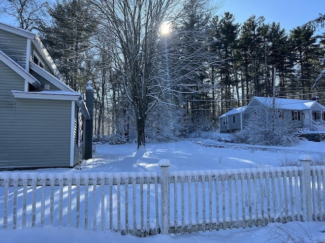 view of yard covered in snow