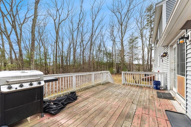 wooden terrace with area for grilling