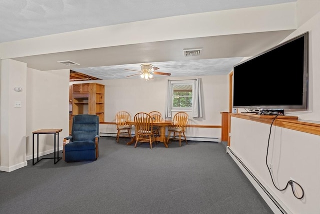 171 Taft Rd, Wilmington, MA 01887 - dining area featuring a baseboard heating unit, carpet, and ceiling fan