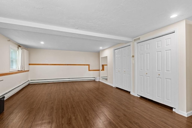 171 Taft Rd, Wilmington, MA 01887 - basement with baseboard heating, wood finished floors, and recessed lighting