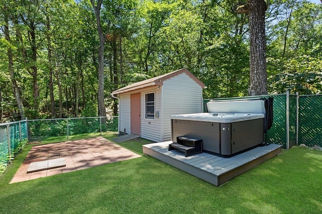 171 Taft Rd, Wilmington, MA 01887 - view of outdoor structure with a hot tub and a fenced backyard