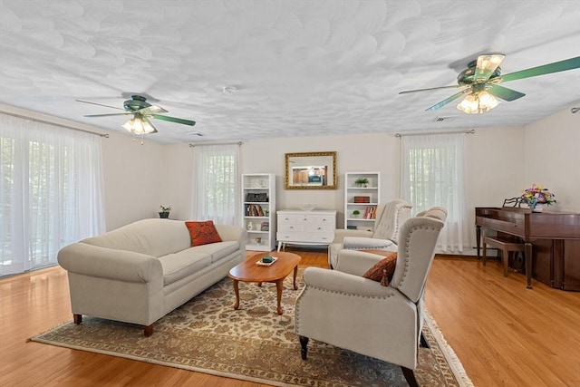 171 Taft Rd, Wilmington, MA 01887 - living area featuring ceiling fan and light wood-type flooring