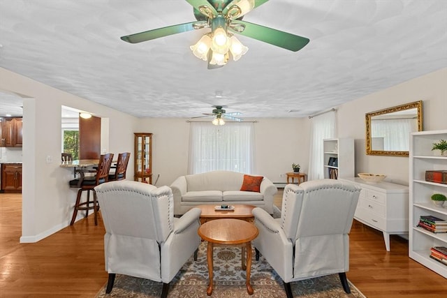 171 Taft Rd, Wilmington, MA 01887 - living area featuring ceiling fan and light wood-style floors