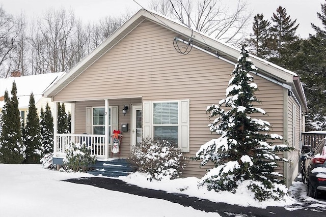 view of front of home featuring covered porch