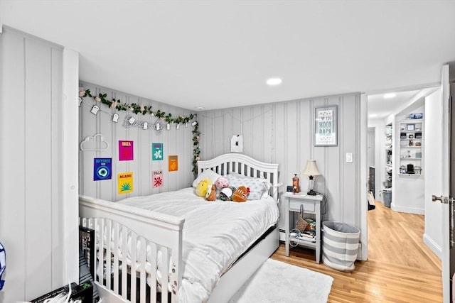 bedroom featuring hardwood / wood-style floors