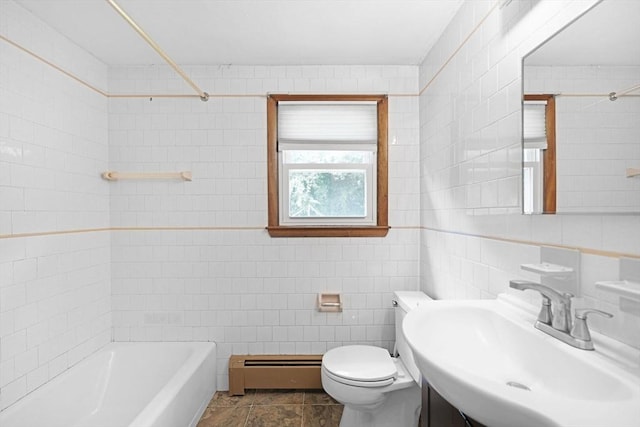 101 Alpha St, Dartmouth, MA 02747 - full bathroom with a baseboard heating unit, a sink, tile walls, toilet, and bathtub / shower combination