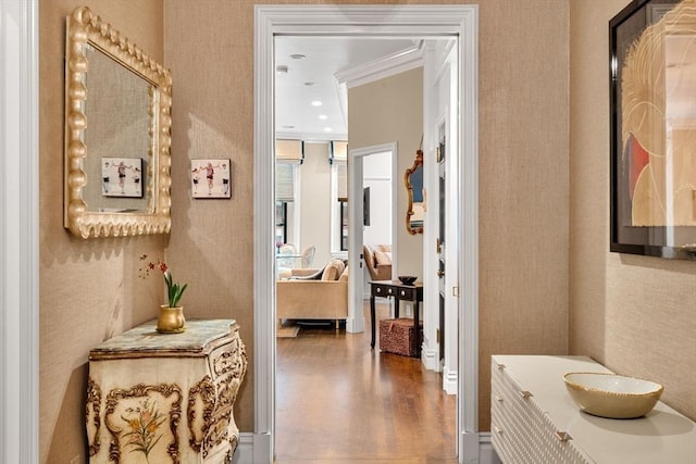 hall with crown molding, recessed lighting, and wood finished floors