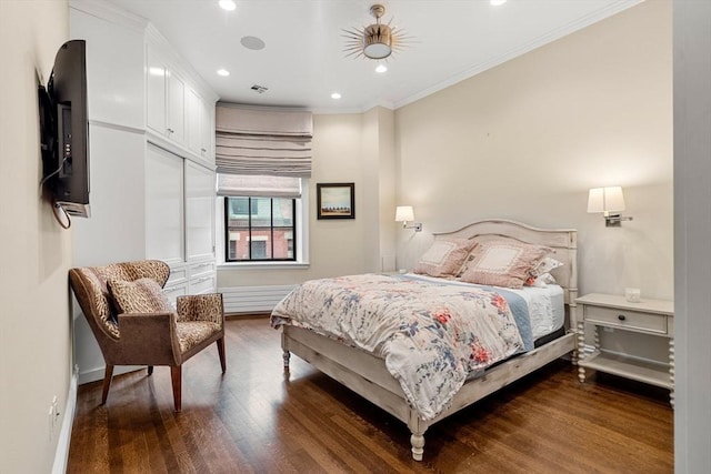 bedroom featuring recessed lighting, dark wood-style floors, baseboards, and ornamental molding