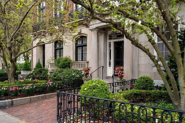 exterior space with a fenced front yard