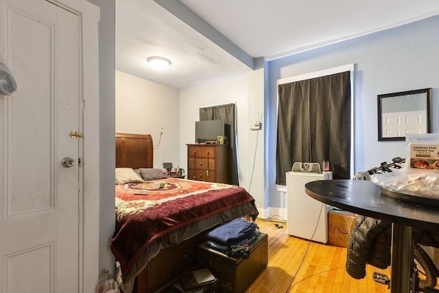 bedroom featuring light hardwood / wood-style flooring