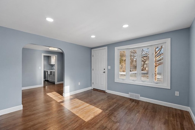 interior space with dark wood-type flooring