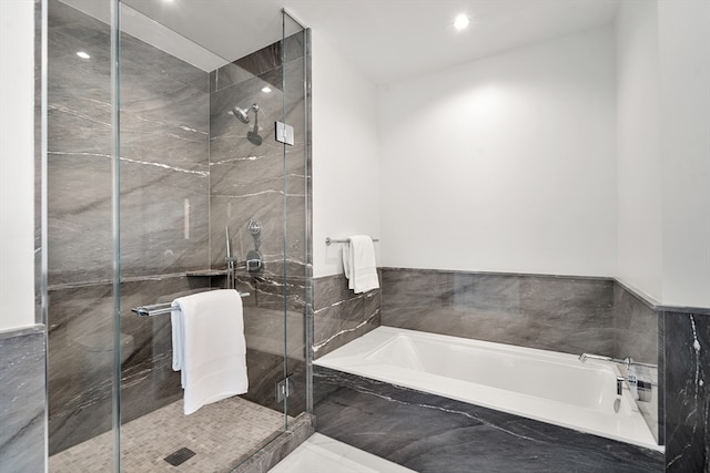 bathroom with plus walk in shower