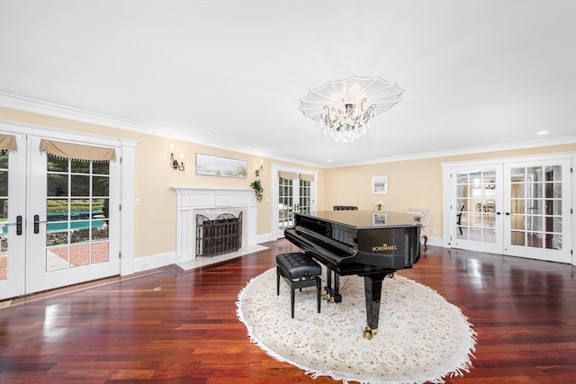 misc room featuring ornamental molding, french doors, and dark hardwood / wood-style floors