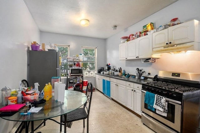 25-29 Astoria St, Boston, MA 02126 - kitchen with a sink, white cabinetry, under cabinet range hood, and stainless steel appliances