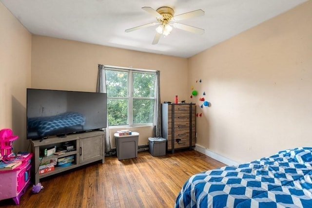 25-29 Astoria St, Boston, MA 02126 - bedroom with baseboards, a ceiling fan, and wood finished floors
