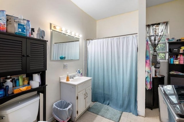 25-29 Astoria St, Boston, MA 02126 - full bath with toilet, tile patterned floors, vanity, and a shower with curtain