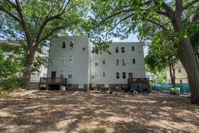25-29 Astoria St, Boston, MA 02126 - rear view of property featuring a wooden deck