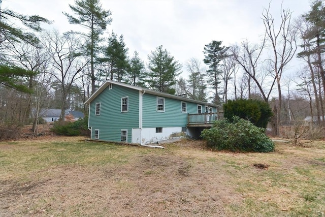 2 Marlboro Rd, Georgetown, MA 01833 - view of home's exterior with a lawn and a deck