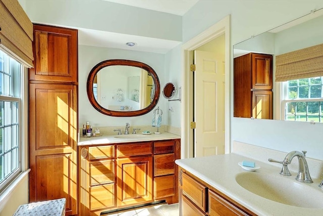 47 Fallon Dr, Westport, MA 02790 - bathroom with vanity and tile patterned flooring
